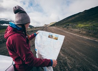 girl with a map for hr 7-Day Ring Road Itinerary