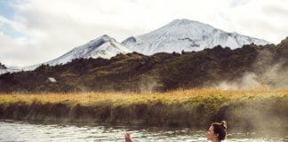 Woman soaking at an Icelandic geothermal hot pot