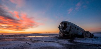DC-3 plane wreck at Solheimasandur beach at the sun setting