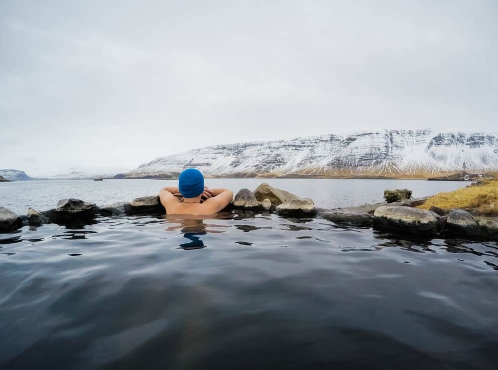 Taking a dip in a geothermal pool is a great winter activity in Iceland