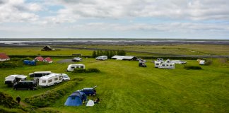 Cars, campervans and motorhomes at Iceland campsite