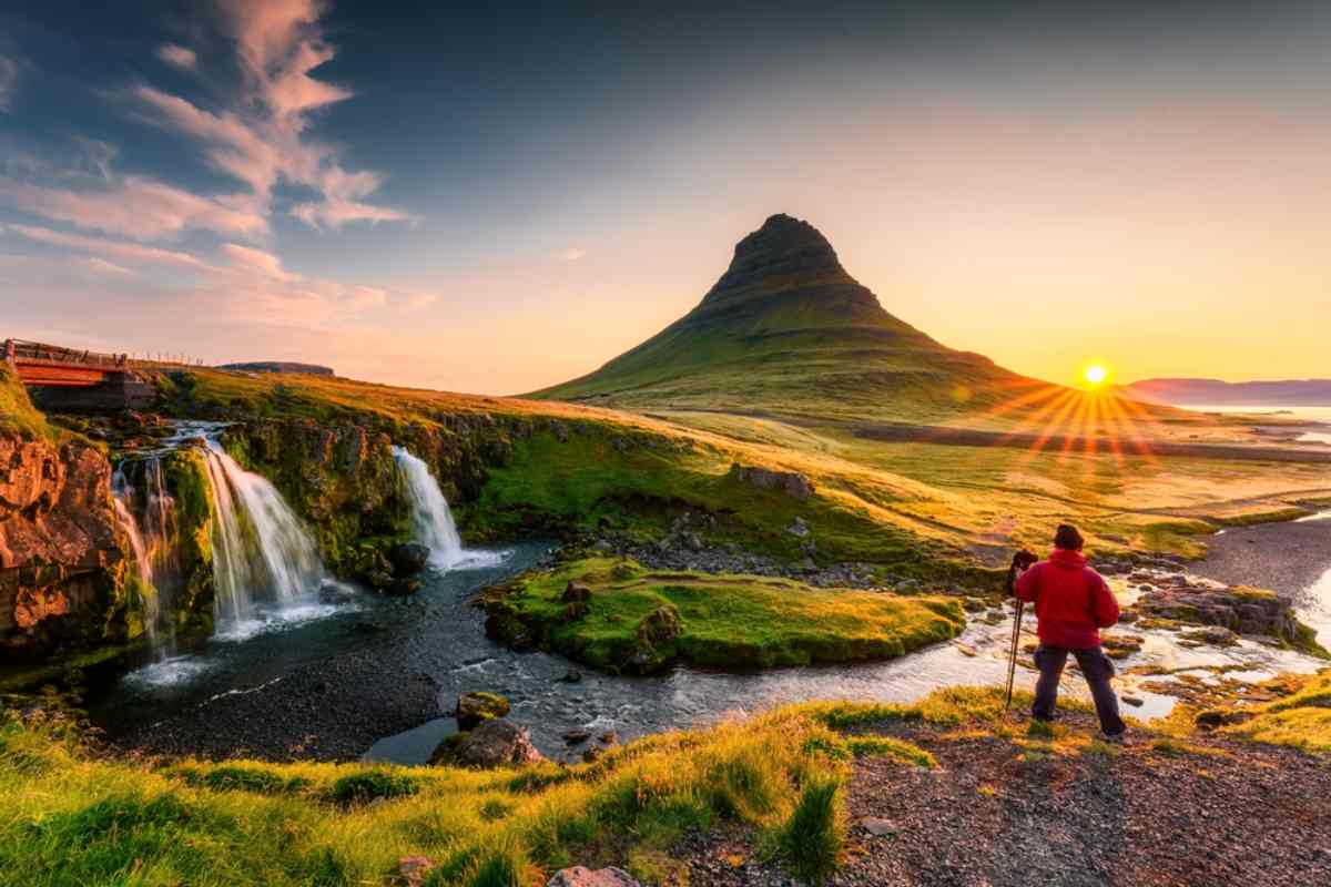 Tourist visiting Kirkjufell in may